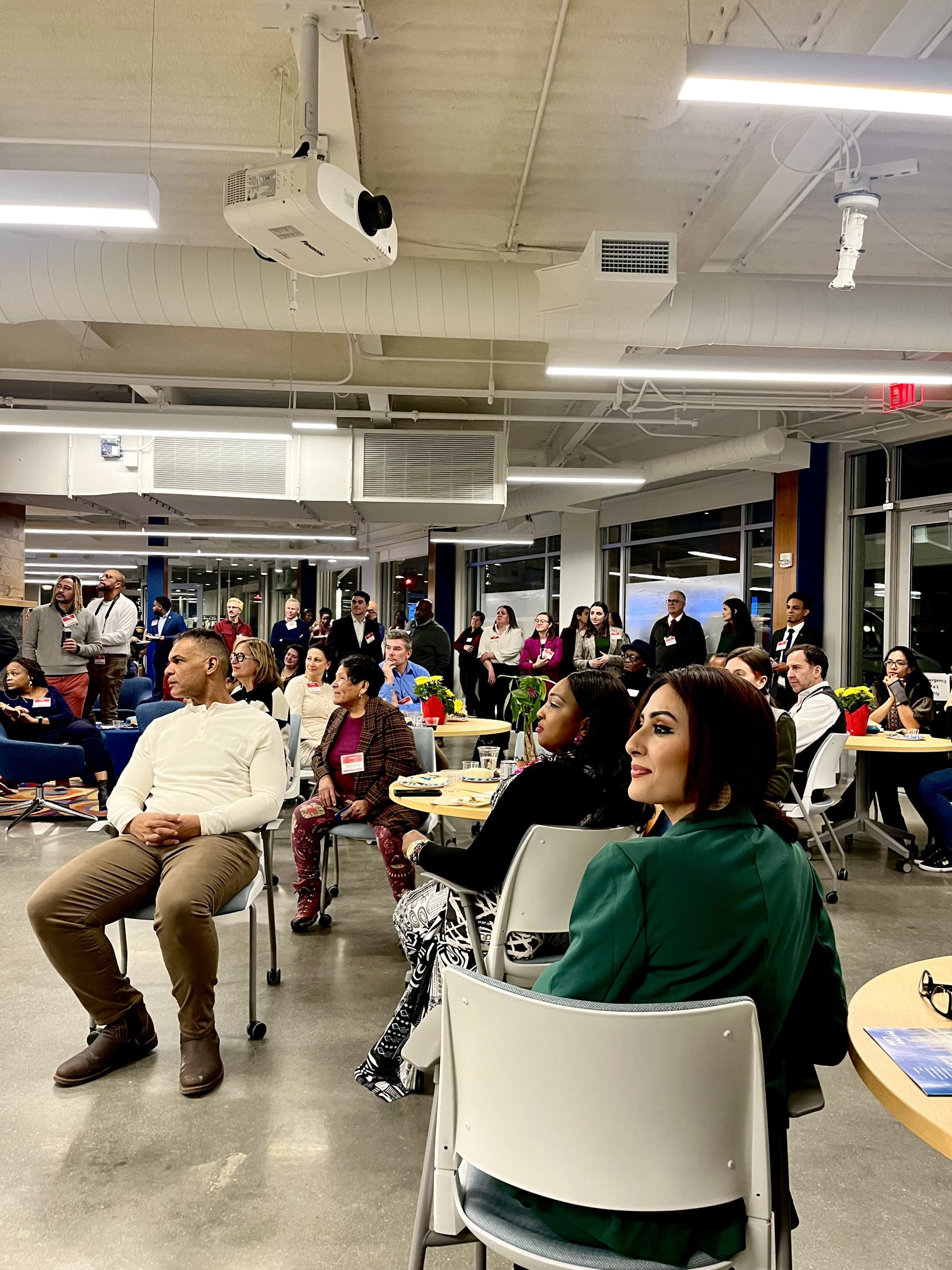 Photo of students networking at symposium event